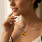 sunflower pendant necklace for women shown in a soft elegant setting with gold floral detailing creating a warm feminine jewelry style