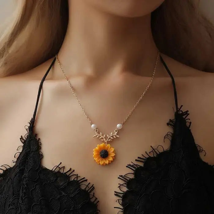 sunflower pendant necklace for women styled with a black lace outfit adding bold floral elegance and a feminine statement jewelry look