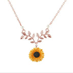 sunflower pendant necklace for women in rose gold displayed with bright floral detailing creating soft romantic feminine jewelry style
(114/120)