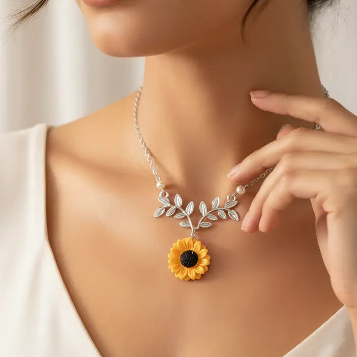 sunflower pendant necklace for women displayed in a silver floral design offering delicate feminine charm and bright sunflower jewelry style