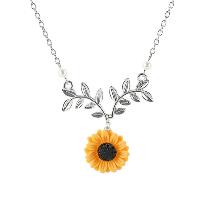 sunflower pendant necklace for women in silver presented on a white background emphasizing delicate floral charm and feminine appeal