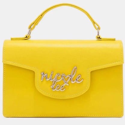 Bright yellow leather handbag with top handle and silver cursive logo on front flap