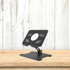 Tablet stand on wooden table with white rustic panel background, ideal for product display or ecommerce.