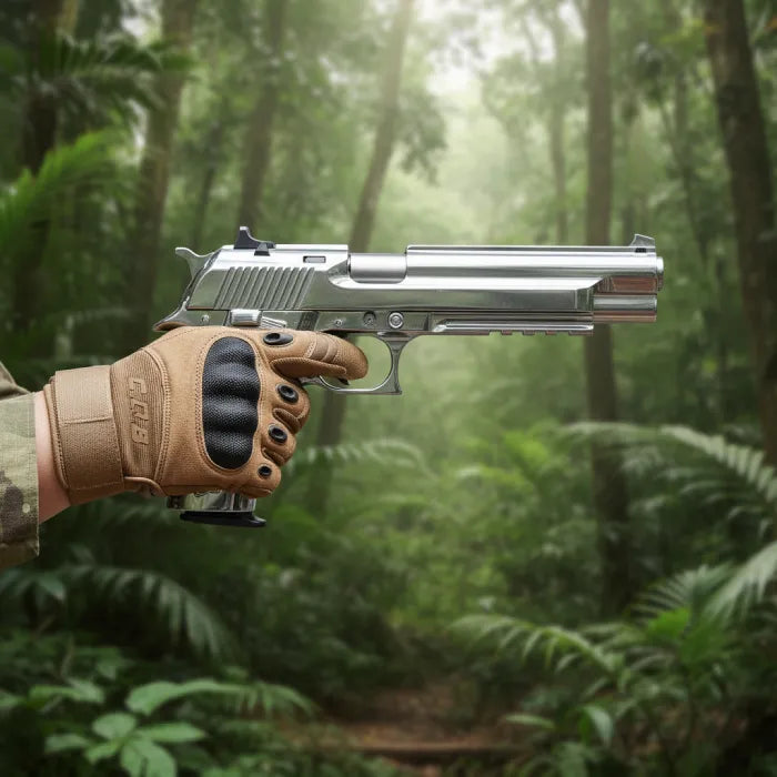 Hand holding a silver revolver with a forest background