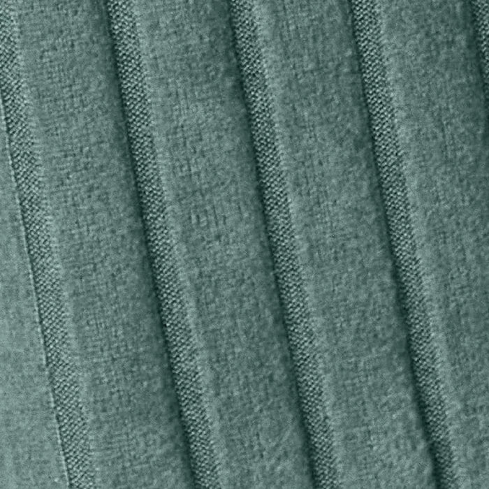 Close-up of forest green ribbed knit fabric showing detailed texture pattern and high-quality material construction