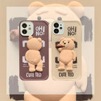 Beige Ted iPhone case protector with a 3D teddy bear holding a cigar, displayed flat on a textured surface.