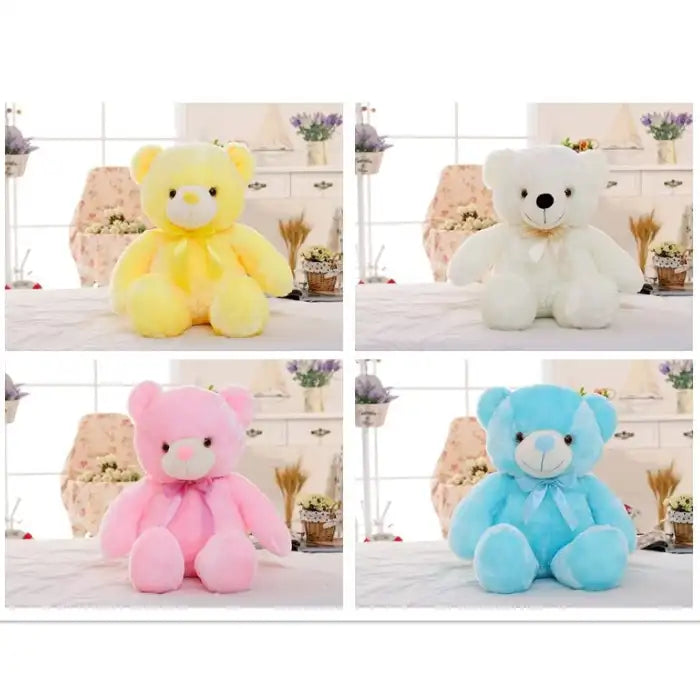 Teddy Bear plush set in yellow, white, pink, and blue displayed indoors