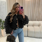  Textured loop knit cardigan jacket in black, mirror selfie showing cropped fit with embellished denim styling.