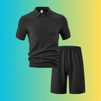 Textured black polo shirt and shorts set for plus size men shown flat without a model