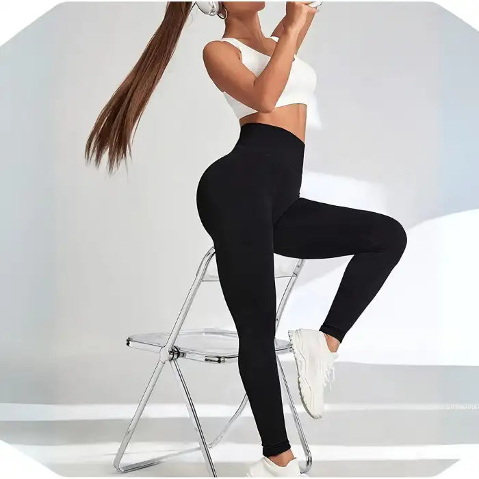 Thermal Yoga Leggings with high-rise waist worn during workout, showcasing flattering athletic fit.
