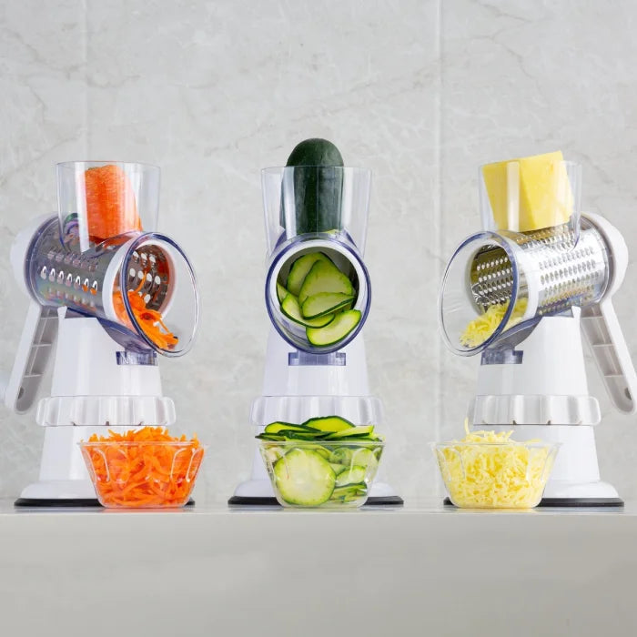 Three manual kitchen graters cutting carrots, cucumber, and cheese, enhancing meal prep.
