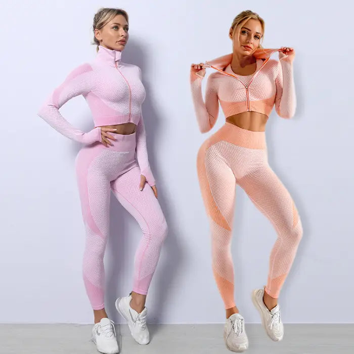 Three-piece seamless yoga set for women in pink and orange colors with textured fabric and snug fit.