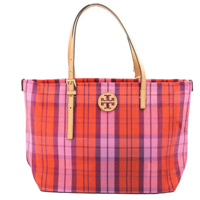 Tory Burch plaid tote bag in red and pink, featuring leather handles and iconic logo on front.