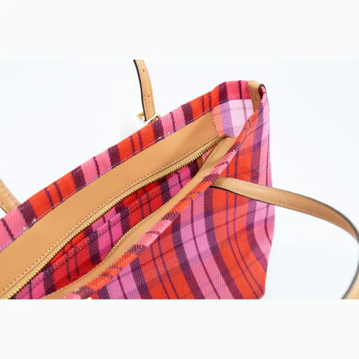 Inside view of Tory Burch plaid tote with zipper closure and spacious interior.