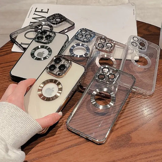 Display of transparent magnetic protective phone cases with metal rings and lens protection features.