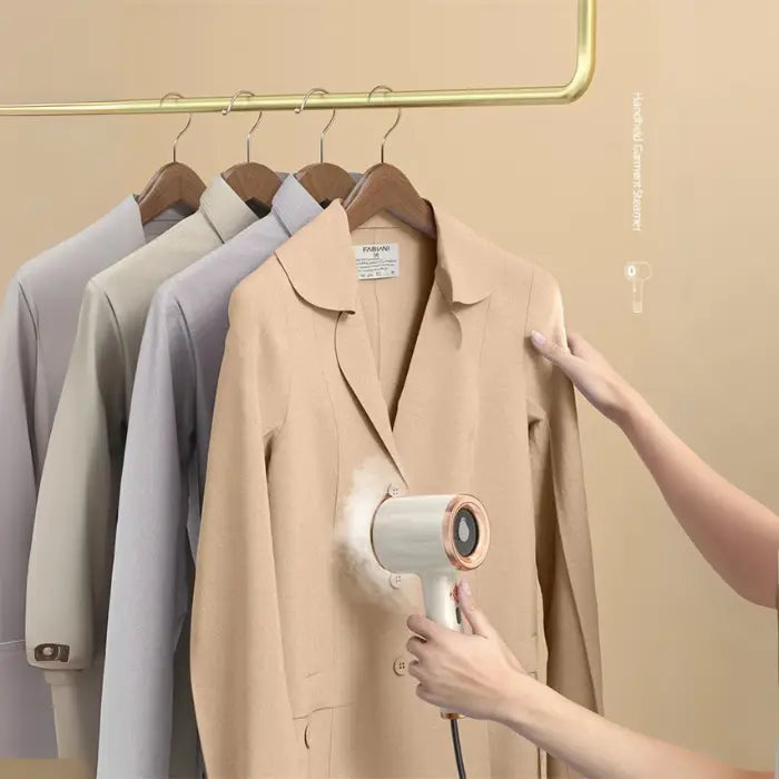  Travel steamer used to steam hanging clothes, removing wrinkles efficiently from jackets and shirts.
