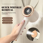  Travel steamer removing wrinkles from beige blazer with steam for smooth garment finish.