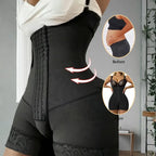 Beige Tummy Control Bodysuit worn in bedroom setting with front hooks and lace hem for full control.