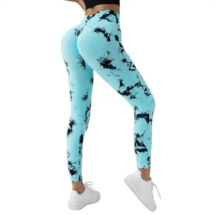 Tummy Control Yoga Pants in light blue with black splatter-dye pattern, scrunch back design.