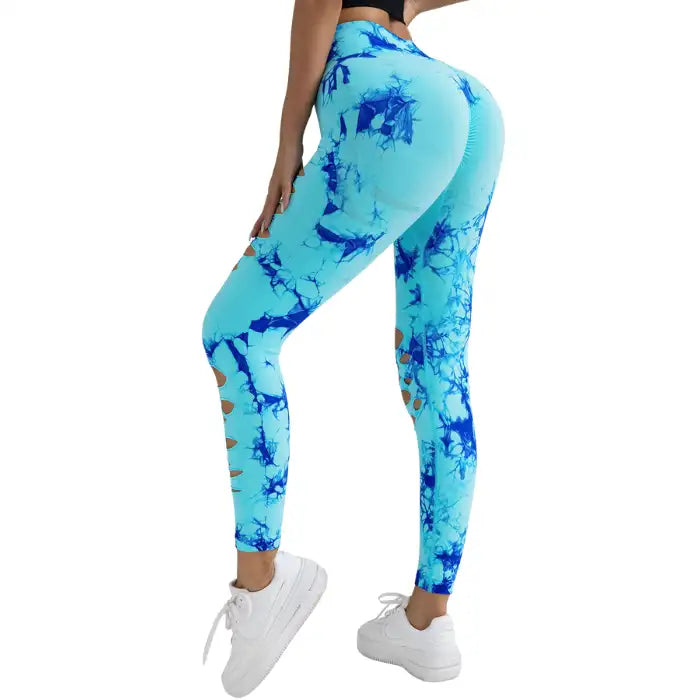 Tummy Control Yoga Pants in aqua and blue with slits, posed from back angle with curve-hugging fit.