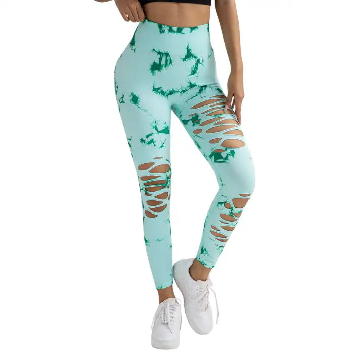 Tummy Control Yoga Pants in mint green with green dye and front slashes, posed at front angle.