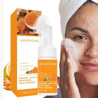 Woman applying turmeric skin cleanser foam to face beside branded product packaging.
