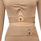 two piece set beige ribbed crop top with gold accent hardware offering a soft neutral look and flattering fit