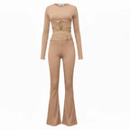 two piece set beige ribbed outfit with long sleeve crop top and flared pants designed for a sleek flattering fit