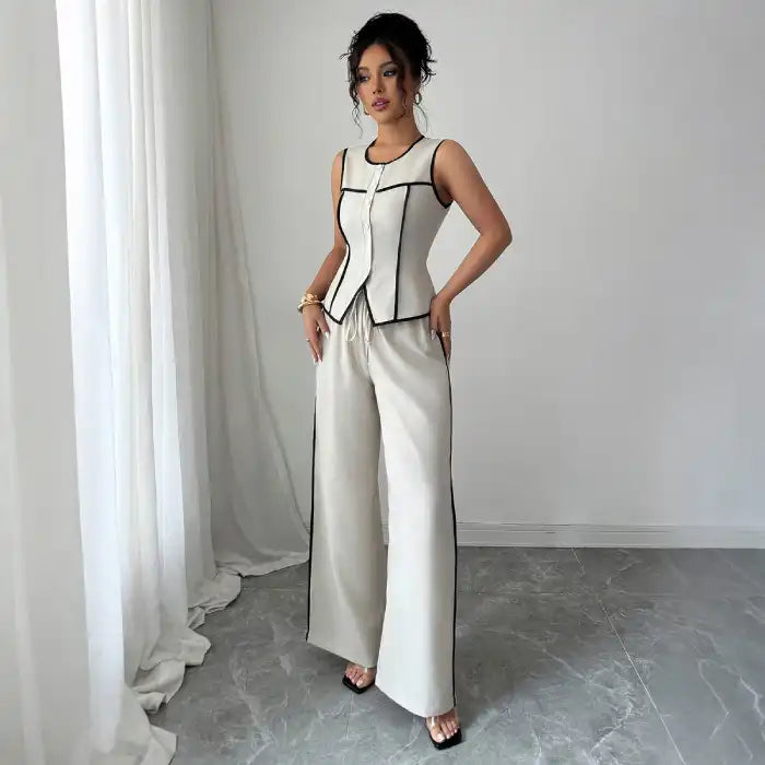 two-piece-set-ivory-vest-pants shown as chic sleeveless vest with drawstring wide pants offering polished day to night