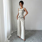 two-piece-set-ivory-vest-pants shown as chic sleeveless vest with drawstring wide pants offering polished day to night