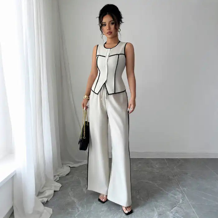 two-piece-set-ivory-vest-pants featuring tailored ivory vest and wide leg pants with contrast trim for elegant style
