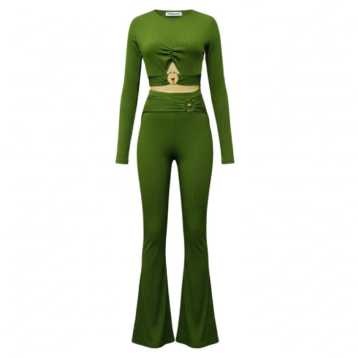 two piece set in green featuring ribbed fabric, long sleeve crop top and flared pants with gold hardware detail