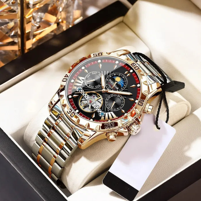 Premium two-tone gold automatic watch showcased in white display case with chronograph functions