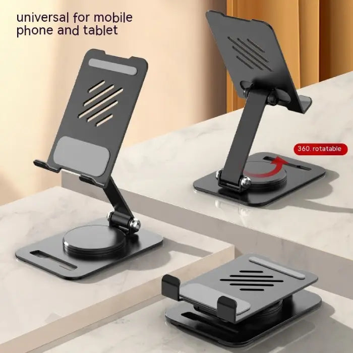 Phone stand in black and silver finish displayed on marble surface with 360-degree rotation indicator