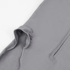 V neck shapewear bodysuit fabric close-up in grey, showing leg opening details, smooth stitching, and soft compression material for comfort