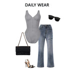 V neck shapewear bodysuit in grey shown with jeans, heels, and accessories, illustrating how the sculpting piece styles easily for daily wear