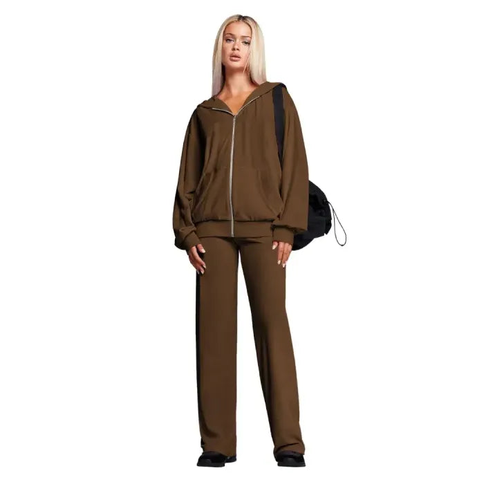 Velour tracksuit in mocha brown with zip hoodie and straight leg pants, perfect for cozy airport style and lounging