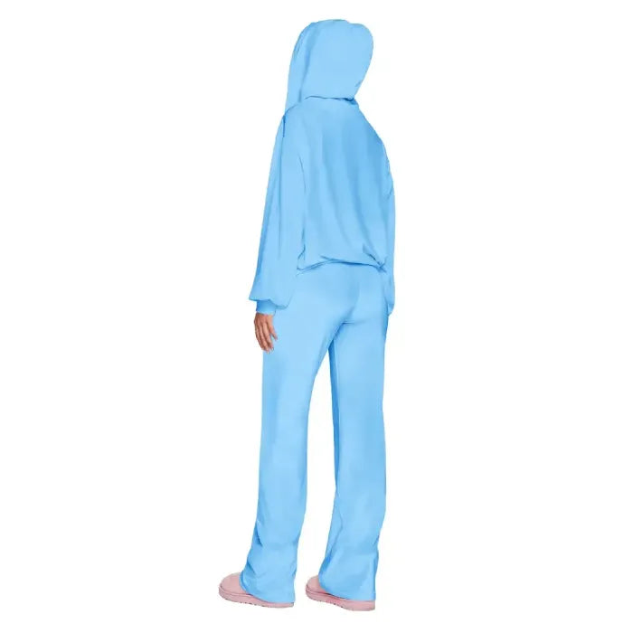 Velour tracksuit back view in sky blue highlighting a draped hoodie and flowing pants for smooth comfort and relaxed wear