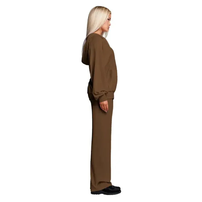Velour tracksuit in chocolate brown displayed from the side featuring a loose hoodie and wide leg pants for cozy comfort