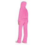 Velour tracksuit back view in pink showing a relaxed hoodie and wide leg pants for plush comfort and casual wear