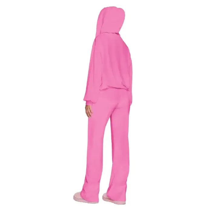Velour tracksuit back view in pink showing a relaxed hoodie and wide leg pants for plush comfort and casual wear