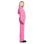 Velour tracksuit in pink shown from the side with a relaxed zip hoodie and wide leg pants for soft luxury comfort
