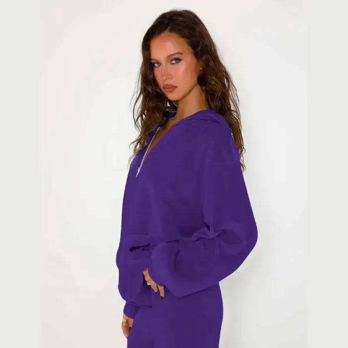 Velour tracksuit in purple close-up showing soft zip hoodie fabric with relaxed fit for luxe comfort and street style