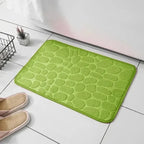 Vibrant green bathroom mat, adds color and style to bathrooms.