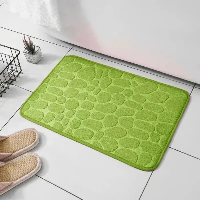 Vibrant green bathroom mat, adds color and style to bathrooms.