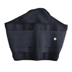 Waist trainer in all-black with double compression straps and breathable mesh fabric for strong waist support.