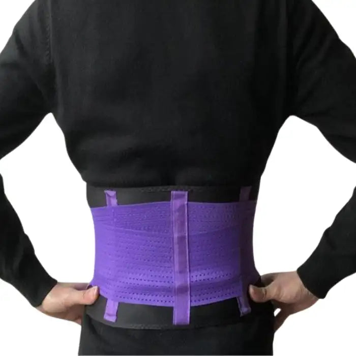 Waist trainer in purple and black shown on man’s back, offering unisex support and compression design.