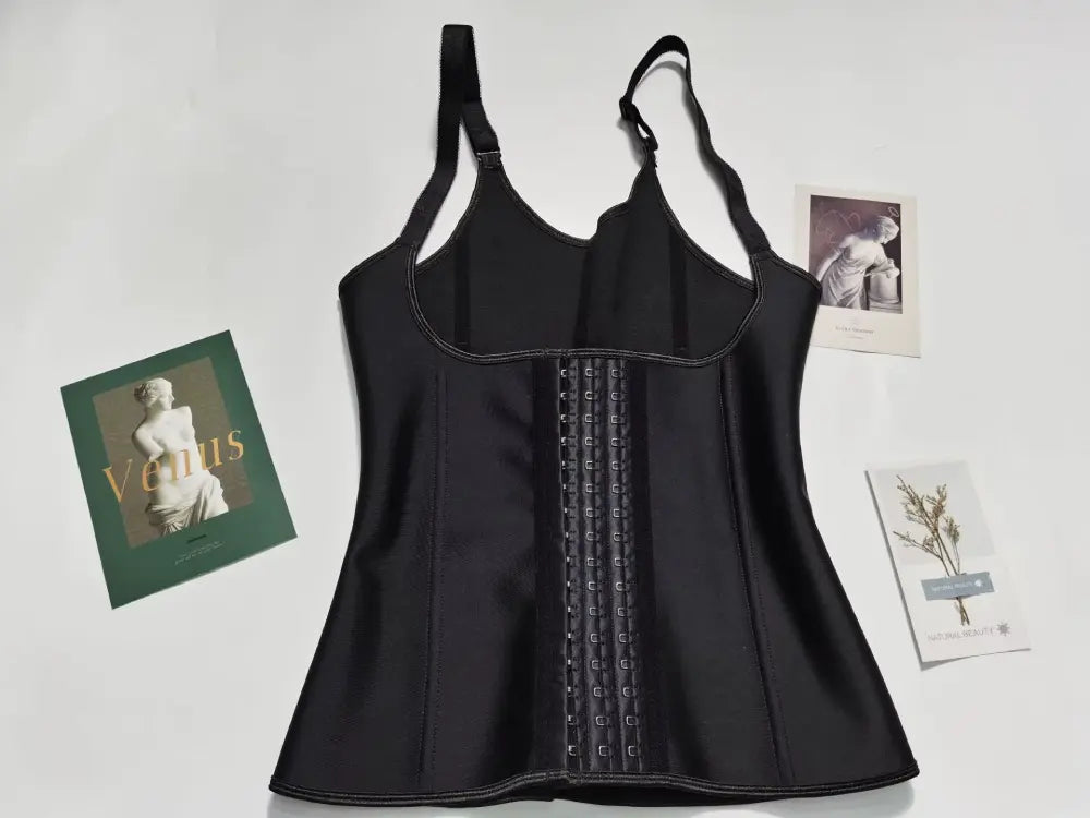Waist trainer vest shown on model highlighting adjustable hook-and-eye closures for firm compression and hourglass shaping