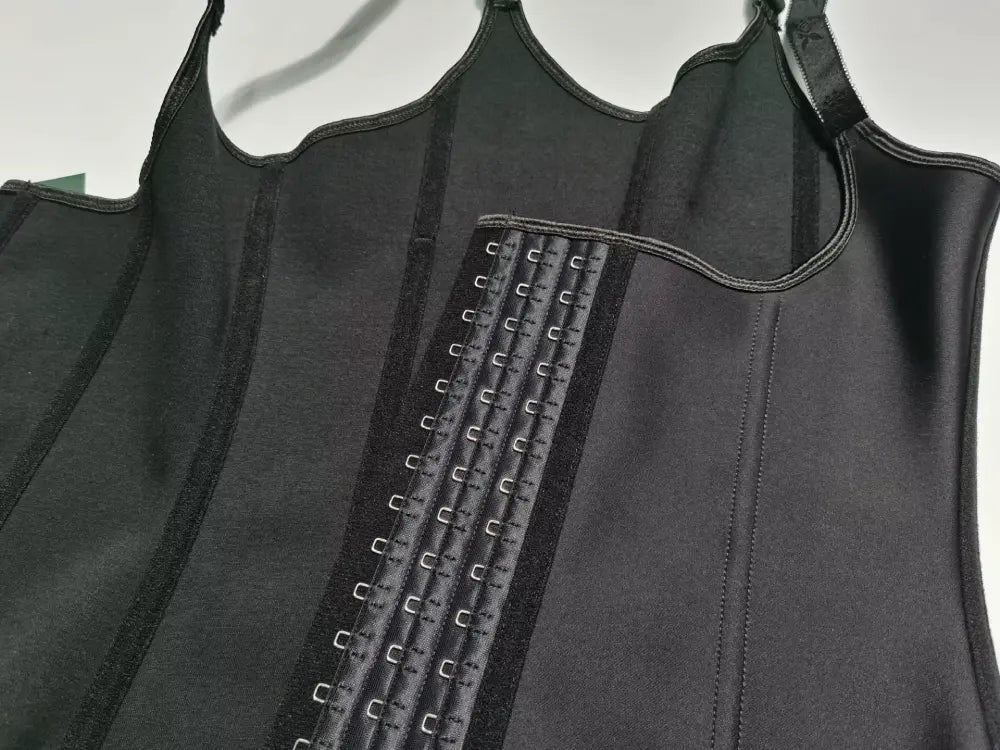 Waist trainer vest side profile showing sculpted waist shaping and smooth torso compression panels