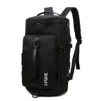 Waterproof duffle bag in black with front zipper pocket and durable backpack-style straps.